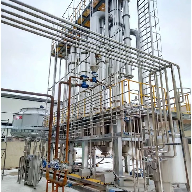Falling film vacuum evaporator