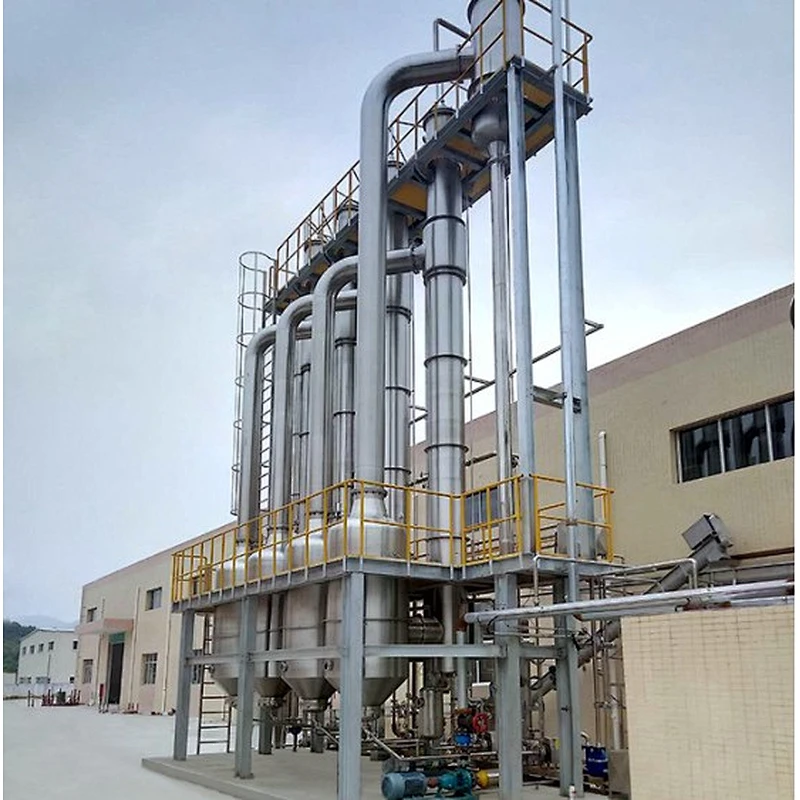 Falling film vacuum evaporator